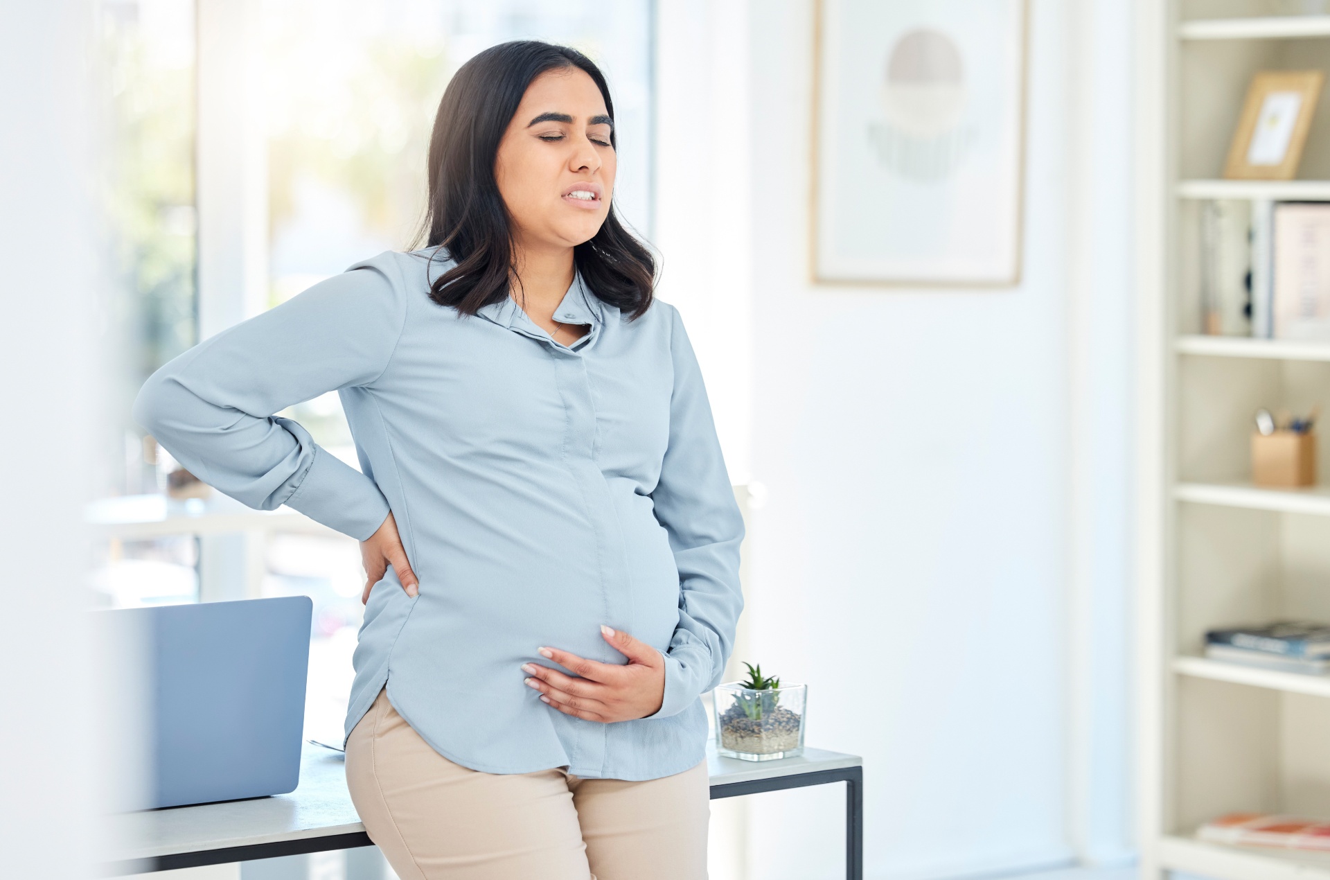 Lower back pain and pelvic pressure